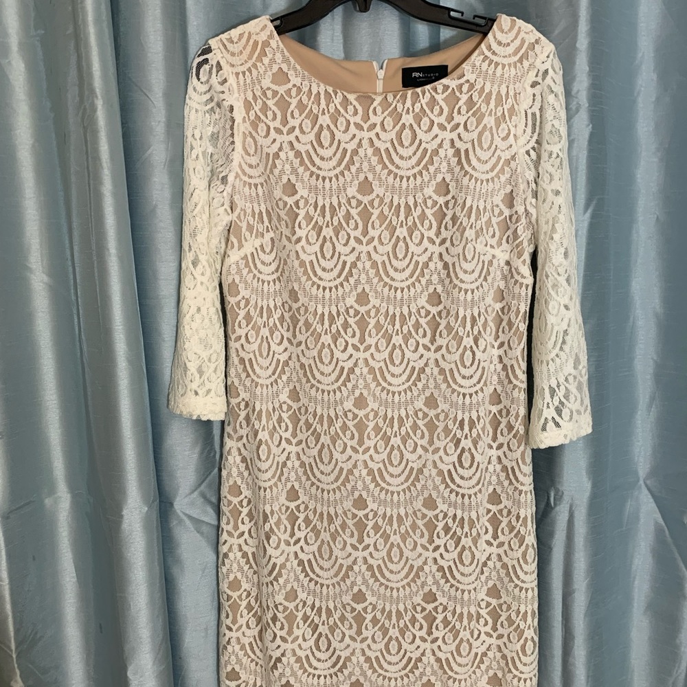 Beautiful lace overlay with backing women’s dress cream.
